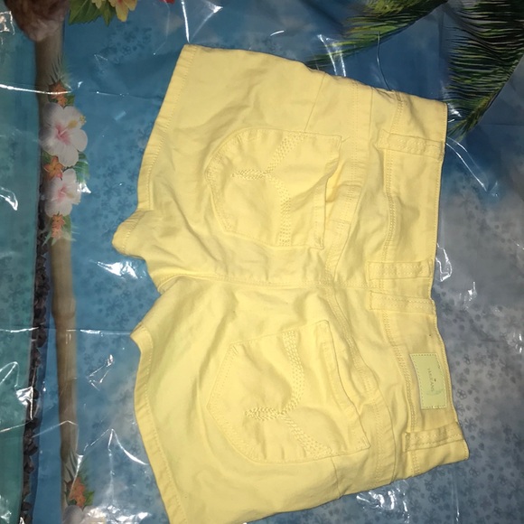 This is A cute pair of pastel yellow shorts - Picture 2 of 3